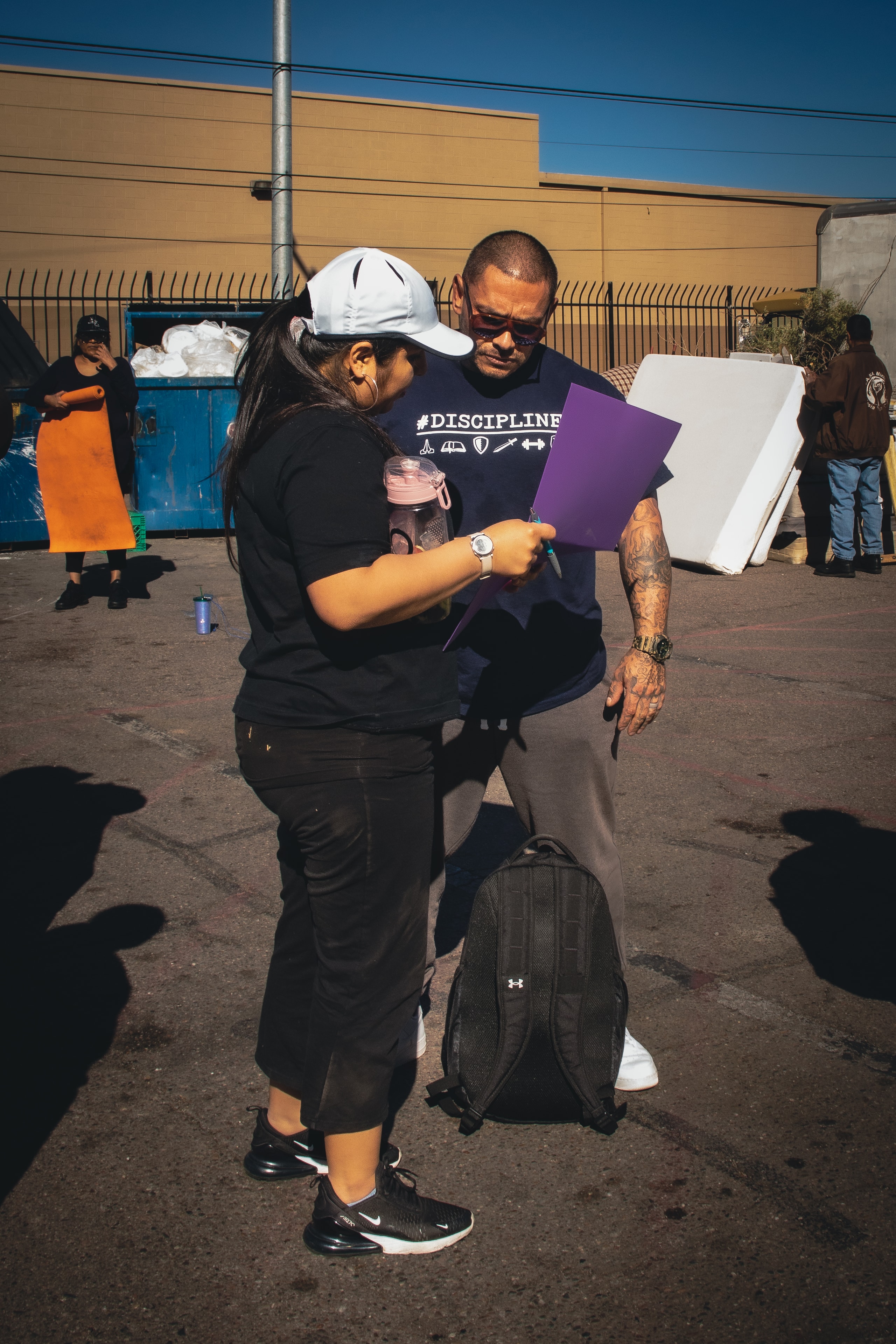 Julio reviewing a plan with a program participant